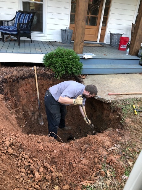 Drain field excavation, repair, and replacement work in progress