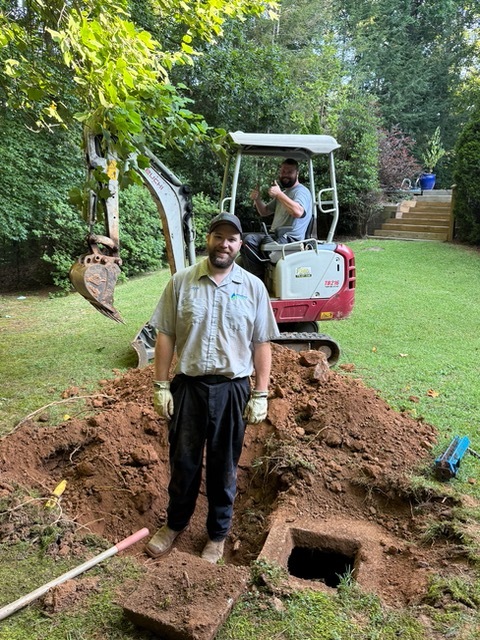 Independent Septic technicians preparing for drain field repair and replacement